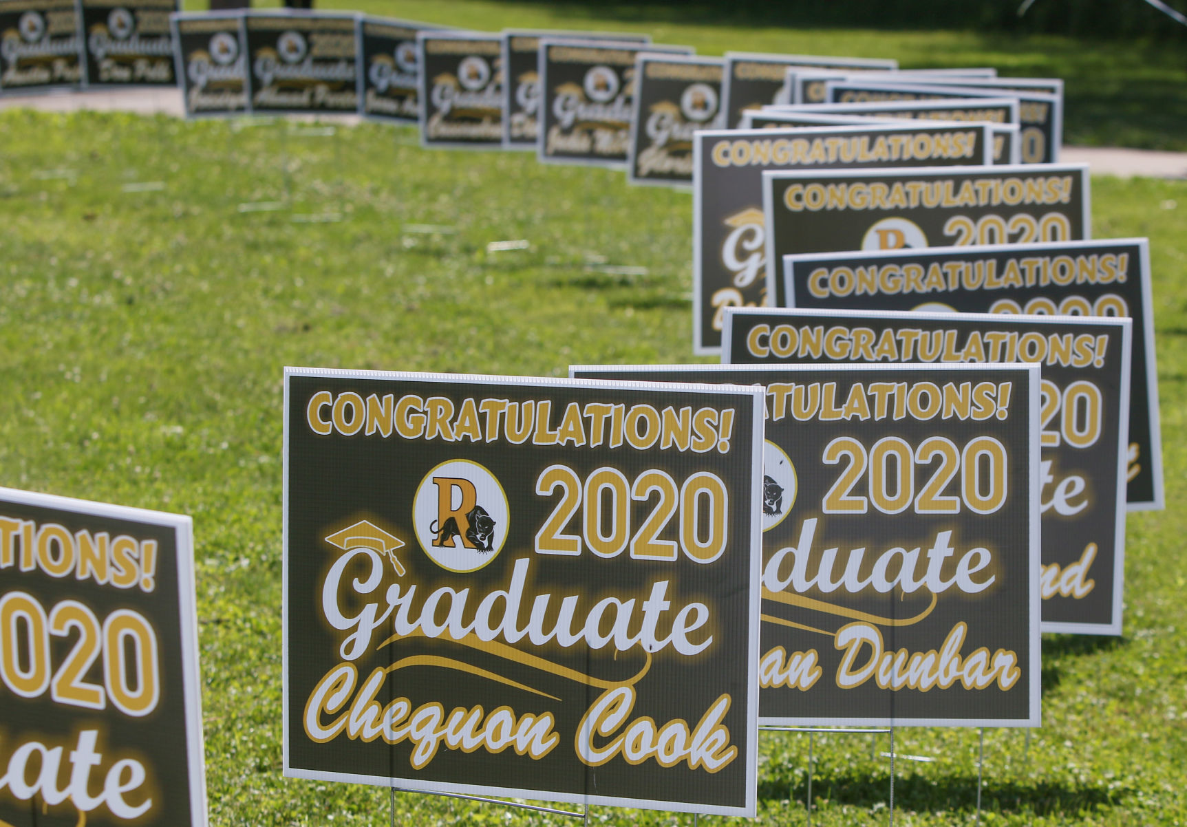 The last graduating class from Roosevelt College and Career Academy graduates